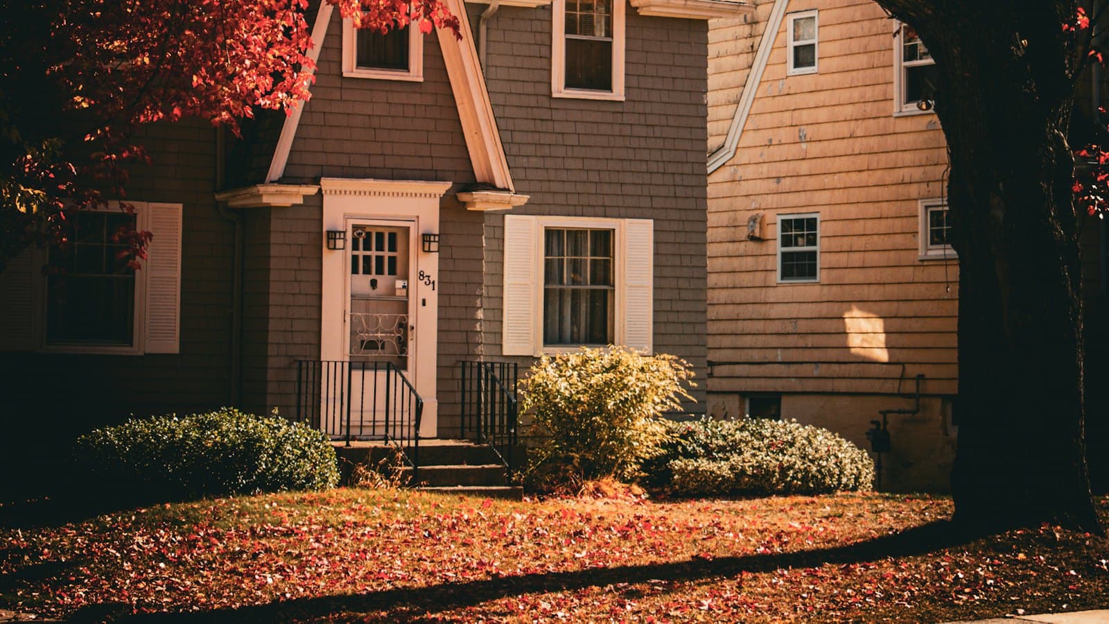 Home surrounded by red autumn foliage