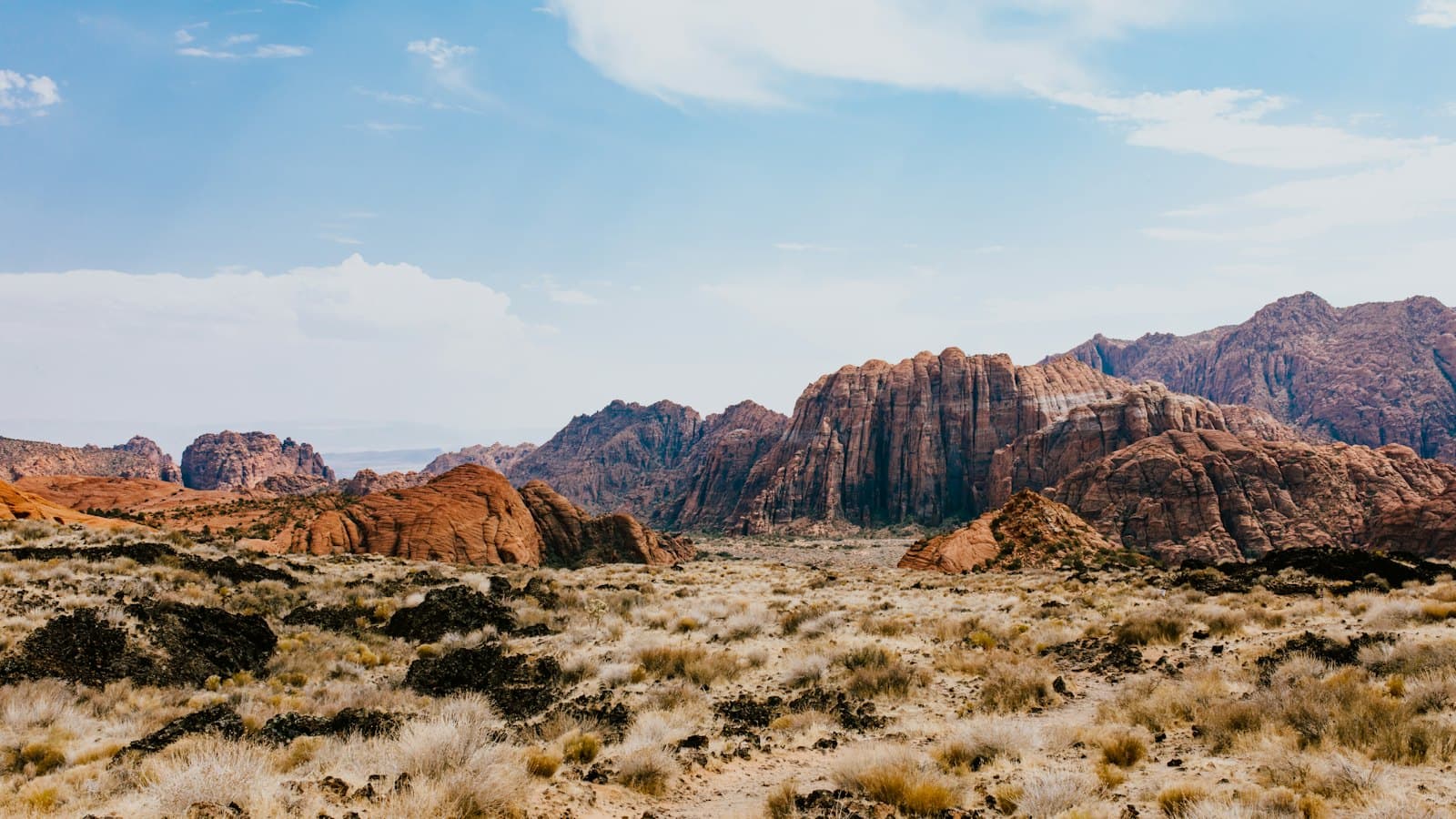 Red rock cliffs and desert brush in St. George, Utah