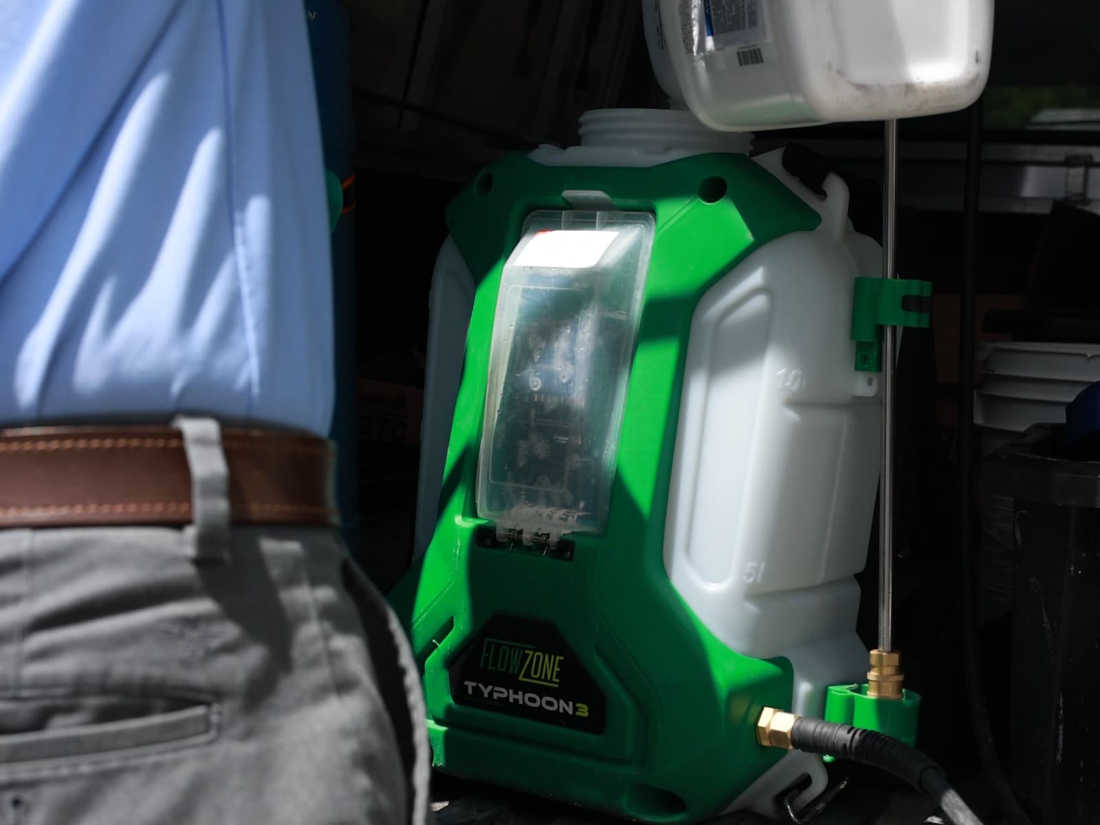 A Butter Pest Control technician with a backpack sprayer